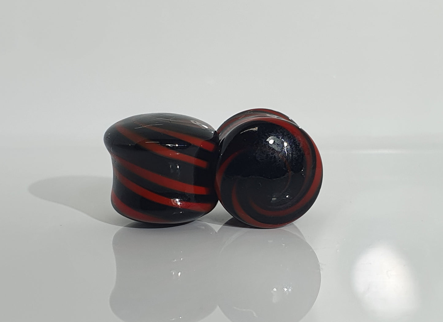 Black and Red Swirl Glass Plug