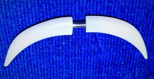 Septum Tusk - these bone tusk are retro items from the 1990s
