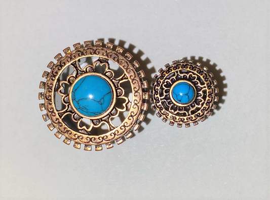 Aztec brass front with turquoise center stone