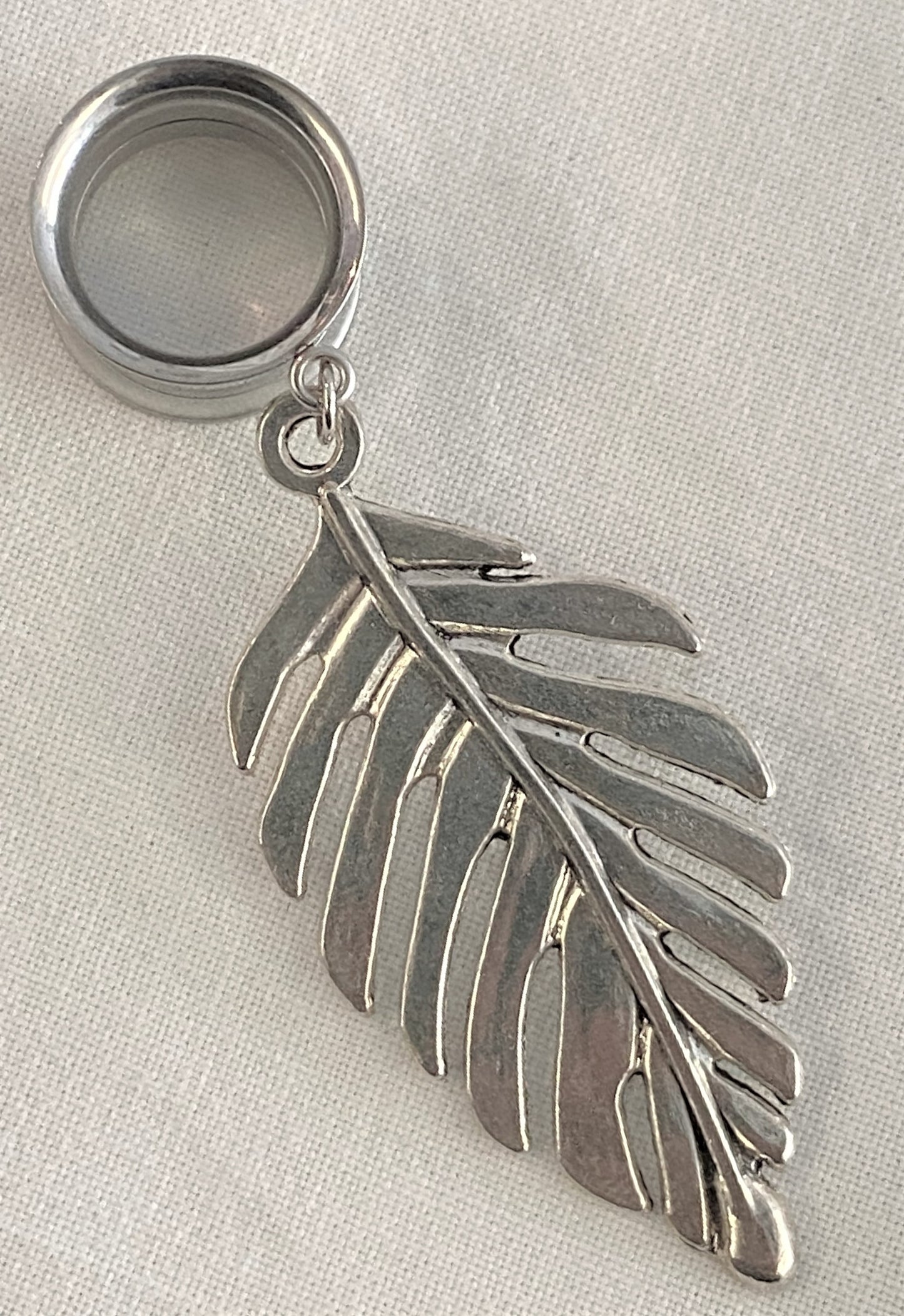 Surgical Steel plug with a gorgeous leaf drop silver pendant (Threaded Back)
